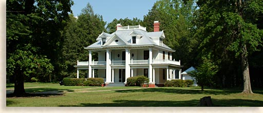 White Neo-Classical Revival House